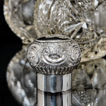 Pair of large Victorian cut glass & sterling-silver-mounted perfume bottles