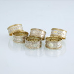 Set of six Victorian parcel-gilt sterling silver napkin rings