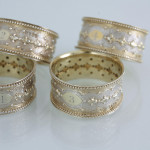 Set of six Victorian parcel-gilt sterling silver napkin rings