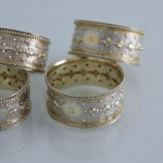 Set of six Victorian parcel-gilt sterling silver napkin rings