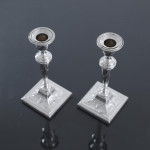 Pair of small square-based neoclassical style sterling silver candlesticks