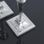 Pair of small square-based neoclassical style sterling silver candlesticks