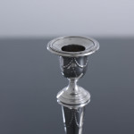 Pair of small square-based neoclassical style sterling silver candlesticks