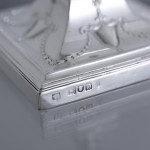 Pair of small square-based neoclassical style sterling silver candlesticks
