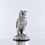 Sterling silver long-eared owl model on an ebonised plinth
