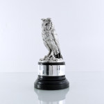 Sterling silver long-eared owl model on an ebonised plinth