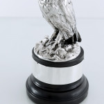 Sterling silver long-eared owl model on an ebonised plinth