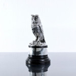 Sterling silver long-eared owl model on an ebonised plinth