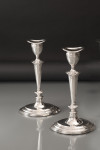 Set of four antique sterling silver candlesticks in the neoclassical style