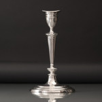 Set of four antique sterling silver candlesticks in the neoclassical style