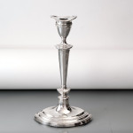 Set of four antique sterling silver candlesticks in the neoclassical style
