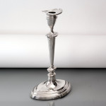 Set of four antique sterling silver candlesticks in the neoclassical style