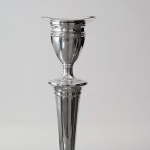 Set of four antique sterling silver candlesticks in the neoclassical style
