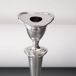 Set of four antique sterling silver candlesticks in the neoclassical style