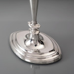 Set of four antique sterling silver candlesticks in the neoclassical style