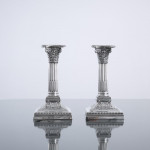 Pair of small Edwardian Corinthian-style sterling silver candlesticks
