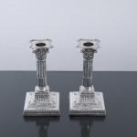 Pair of small Edwardian Corinthian-style sterling silver candlesticks