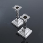 Pair of small Edwardian Corinthian-style sterling silver candlesticks