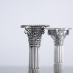 Pair of small Edwardian Corinthian-style sterling silver candlesticks