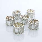 Set of six Victorian pierced sterling silver napkin rings