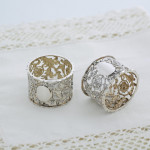 Set of six Victorian pierced sterling silver napkin rings