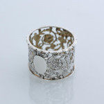 Set of six Victorian pierced sterling silver napkin rings