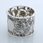Set of six Victorian pierced sterling silver napkin rings