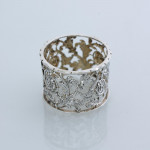 Set of six Victorian pierced sterling silver napkin rings