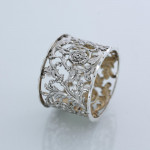 Set of six Victorian pierced sterling silver napkin rings