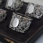Set of six Victorian pierced sterling silver napkin rings