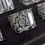 Set of six Victorian pierced sterling silver napkin rings