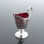 Victorian pierced sterling silver & cranberry glass cream jug
