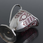 Victorian pierced sterling silver & cranberry glass cream jug