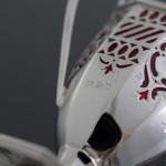 Victorian pierced sterling silver & cranberry glass cream jug