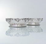 Pair of Victorian pierced & vine-decorated sterling silver wine coasters