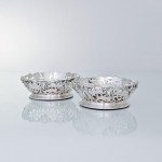 Pair of Victorian pierced & vine-decorated sterling silver wine coasters
