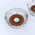 Pair of Victorian pierced & vine-decorated sterling silver wine coasters
