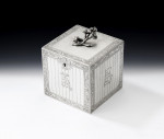 An important & extremely rare early George III Tea Caddy modelled as a Tea Chest.  Made in London in 1767 by Augustin Le Sage.