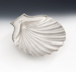 A fine pair of George III Butter Shells made in London in 1777 by Andrew Fogelberg.