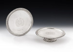 A very important pair of William & Mary Footed Salvers made in London in 1690, Maker's mark of TA with a pellet between