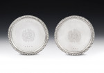 A very important pair of William & Mary Footed Salvers made in London in 1690, Maker's mark of TA with a pellet between