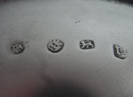 A very important pair of William & Mary Footed Salvers made in London in 1690, Maker's mark of TA with a pellet between