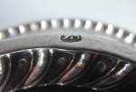 A very important pair of William & Mary Footed Salvers made in London in 1690, Maker's mark of TA with a pellet between
