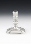 A very rare pair of George I cast Taper Candlesticks made in London in 1725 by Joseph Bird.