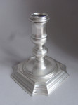 A very rare pair of George I cast Taper Candlesticks made in London in 1725 by Joseph Bird.