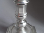 A very rare pair of George I cast Taper Candlesticks made in London in 1725 by Joseph Bird.