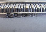 A very fine pair of early George III Cast Tapersticks made in London in 1763 by John Hyatt.