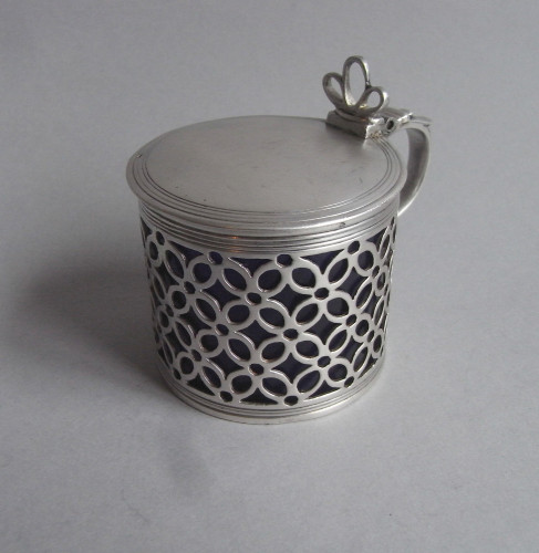 A fine early George III Mustard Pot made in London in 1764 by Samuel Herbert & Company.