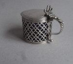 A fine early George III Mustard Pot made in London in 1764 by Samuel Herbert & Company.