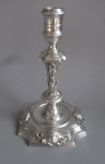 An important, and very unusual, set of four George II Rococo Cast Candlesticks made in London in 1740 by John Swift.